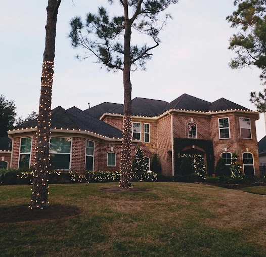 Completed window project on a Houston brick home